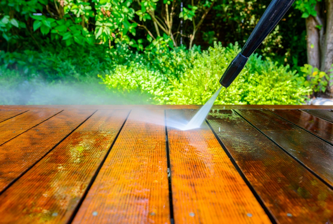 Cleaning deck with power washer